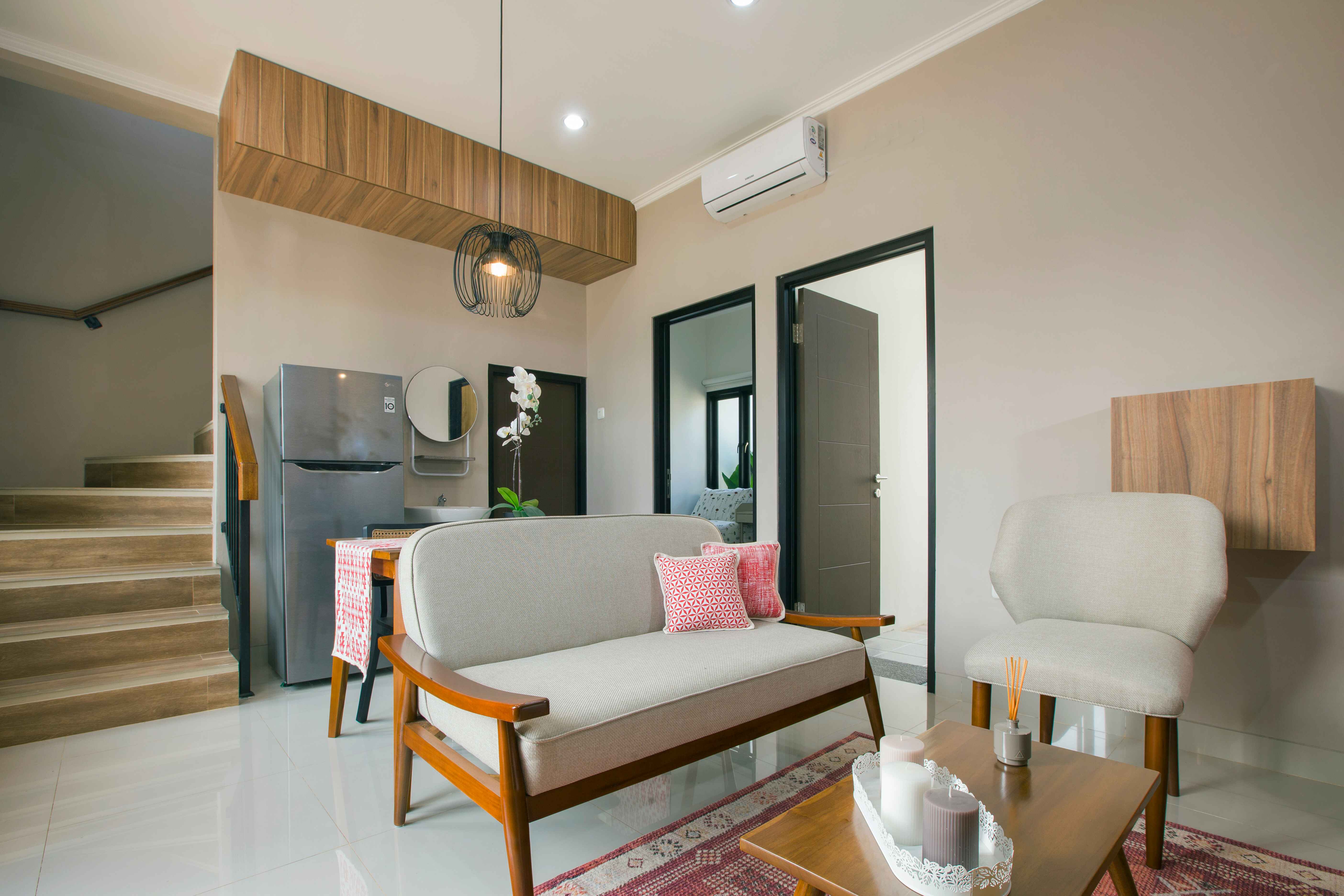 Interior view of a modern bedroom with a bed and decorative items